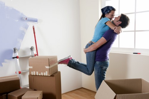 Local moving team handling furniture and boxes in a Portuguese city