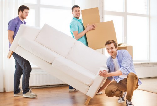 Packing and loading items into a van for transport