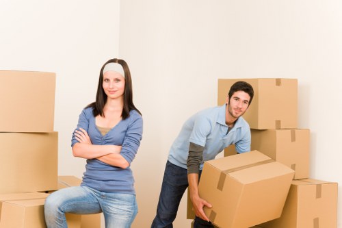Packed moving boxes and furniture ready for transport in Portugal