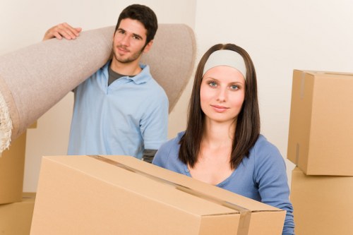 Van removal service loading household items for transport in Portugal