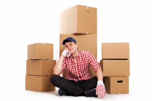 Worker assessing access and handling risks before a removals job